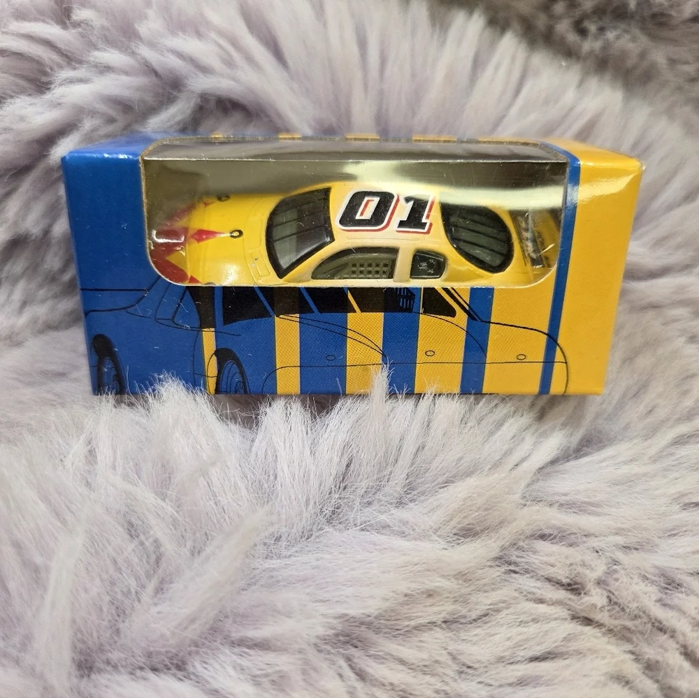 Vintage National Tire Battery Racing Yellow Blue Die-Cast Toy Car